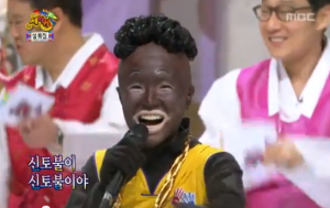 Black face on national television. Shows Korea's lack of exposure/sensitivity to black people.